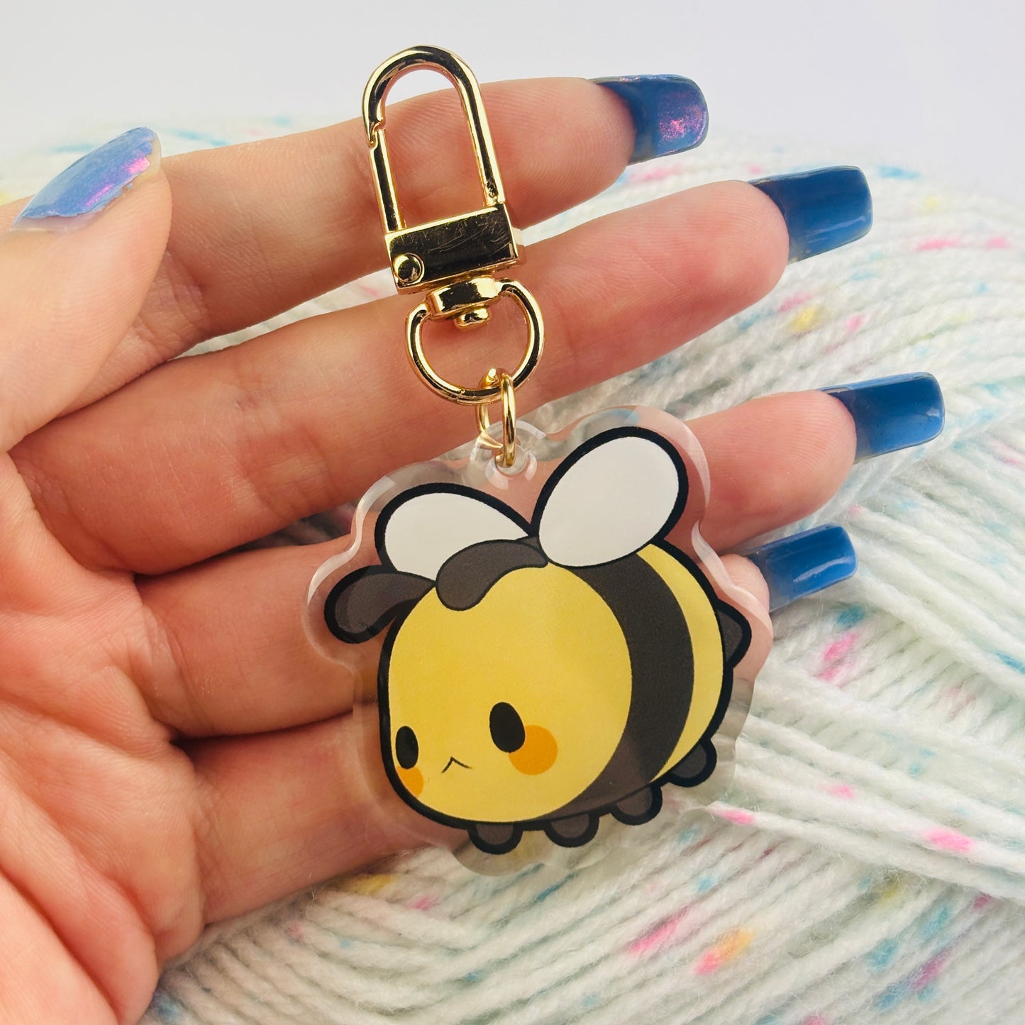 Bee Keychain. An Acrylic keychain of a cute bee with a golden clasp