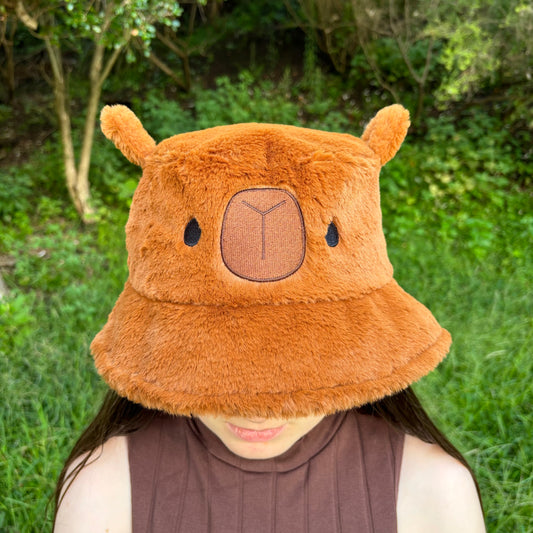 Brown Fluffy Bucket Hat with cute capybara face.